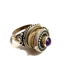 Potion ring silver and amethyst . Size 8 3/4.